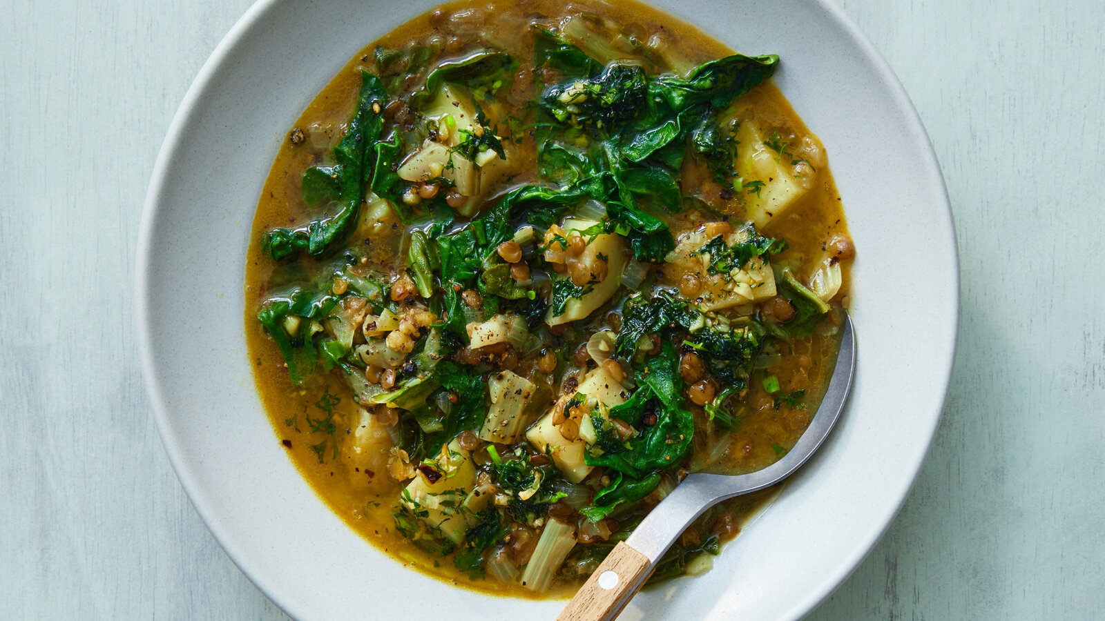 Shorbat Adas bil Hamod (Lentil Soup With Greens)